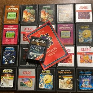 21 vintage Atari games, includes the earth dies Screaming 1983